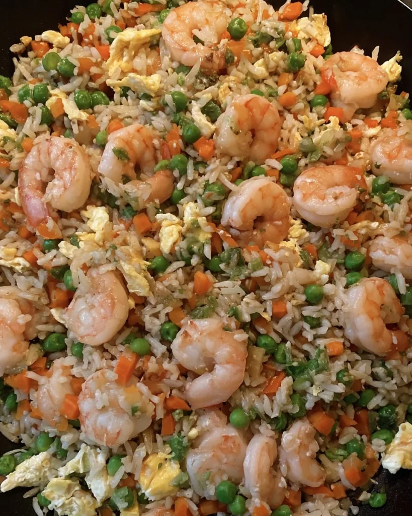 Shrimp fried rice meme ingredients with spatula in light gray skillet
