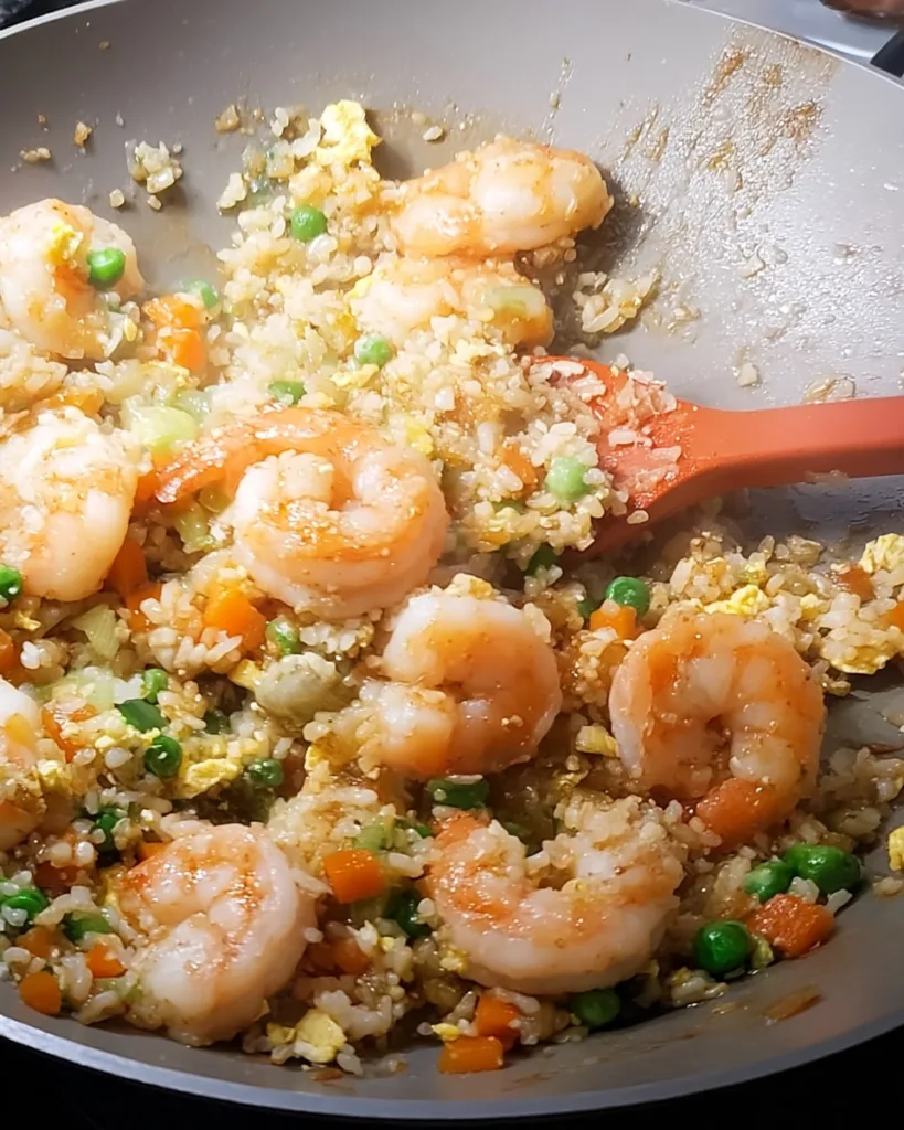 shrimp fried rice recipe finished and served in nonstick skillet